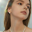 Boucles d'oreilles en argent massif doré à l'or fin, style géométrique, perles baroques naturelles