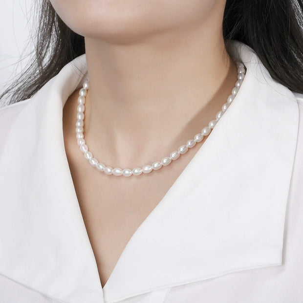 Collier perles naturelles grain de riz en argent massif doré à l'or fin