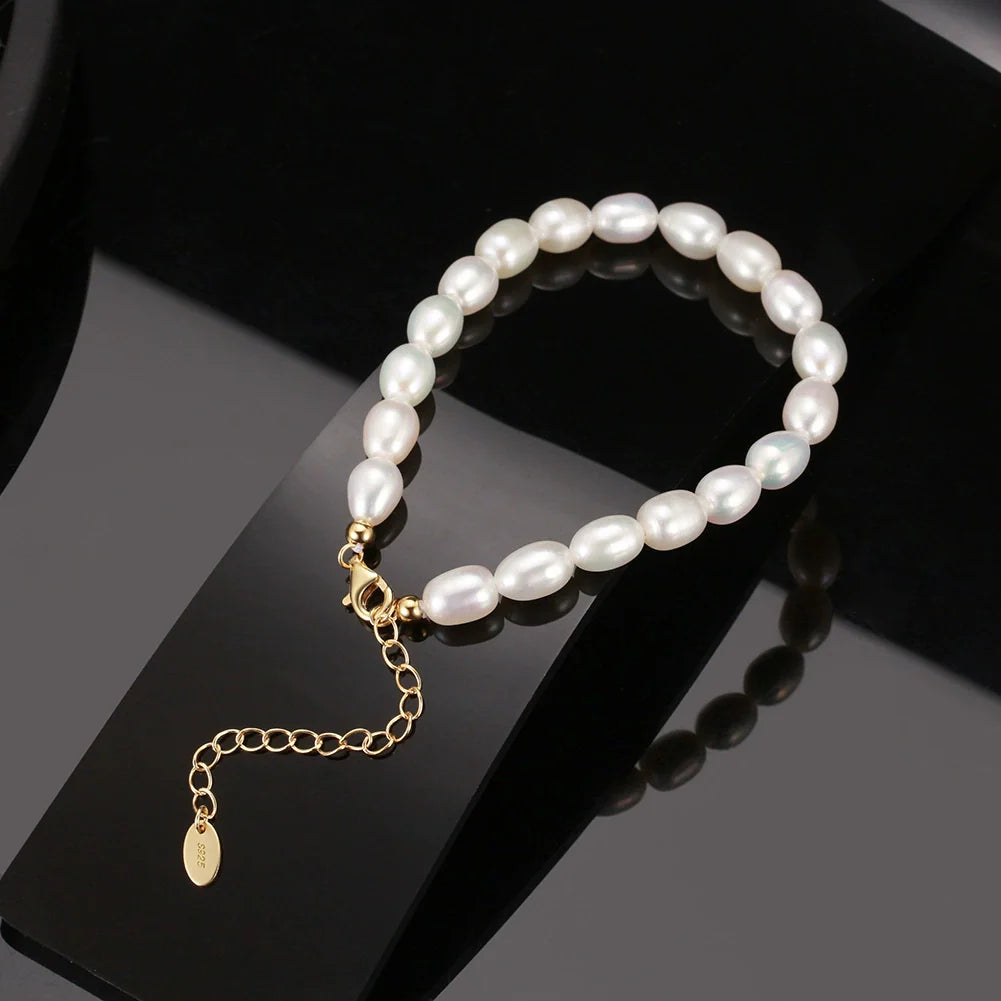 Bracelet perles naturelles grain de riz en argent massif doré à l'or fin