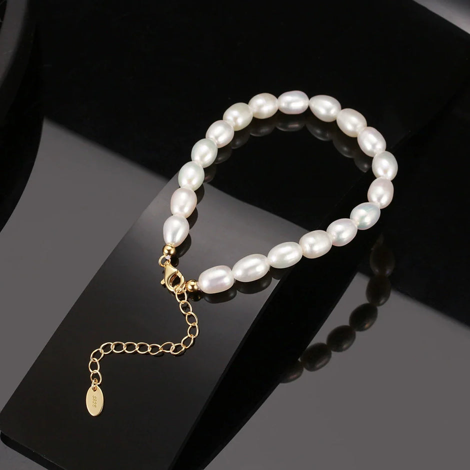 Bracelet perles naturelles grain de riz en argent massif doré à l'or fin