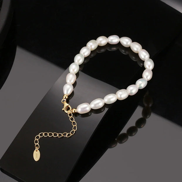Bracelet perles naturelles grain de riz en argent massif doré à l'or fin